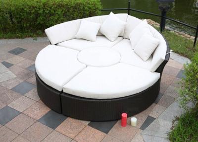 China Black Rattan Sunbed Transformed Into Sofa Tea Table and Foot Pedal for sale