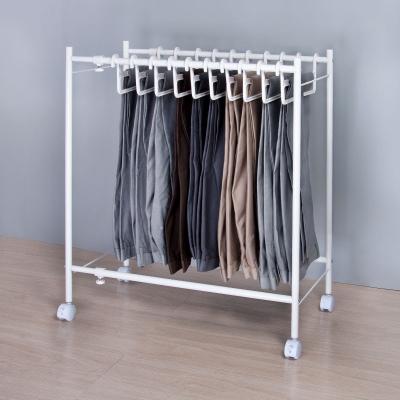 China Removable bathroom and sprayed retractable steel pipe with hanger rack plastic white telescopic pants rack hanger for sale