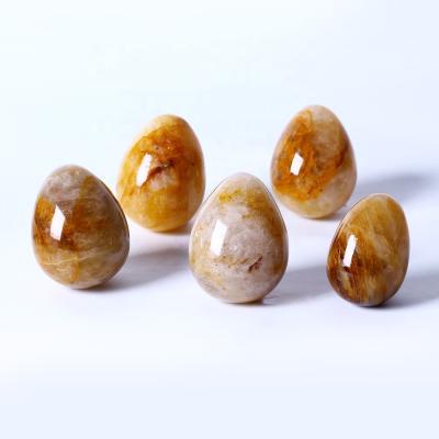 China Wholesale Natural Europe Gemstone Eggs Healing Gold Quartz Crystal Eggs For Home Decoration Stones Fire Gold Quartz Healer for sale