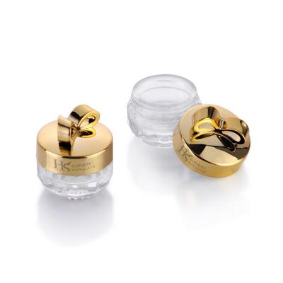 China Other hot wholesale gold paceking cute plastic bowknot Amazon shopping fancy glass cosmetic jars for sale