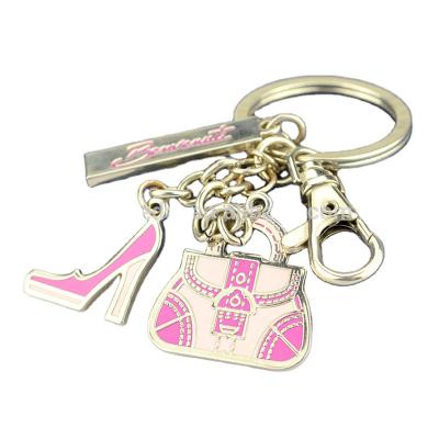 China Wholesale Custom Enamel Decorative Soft Metal Anime Butterfly Makeup Cat Bear Key Ring Pineapple Logo Brooch Apparel Key Chain for sale