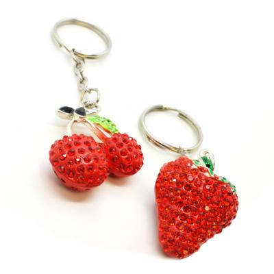 China Coin Key Chain For Shopping Carts Metal Rabbit Cherry Lipstick Holder Doll Lip Chandelier Key Chain Brass Tube for sale