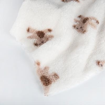 China Soft and Cozy Teddy Bear Print Fleece Fabric for Kids Wear 100% Polyester Customized for sale