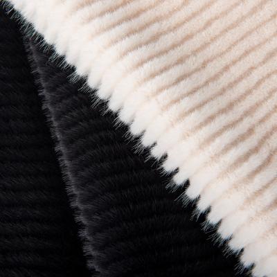 China Soft and Cozy 100% Polyester Tricot Knitted Brushed Faux Fur Fabric for Ladies Coat for sale