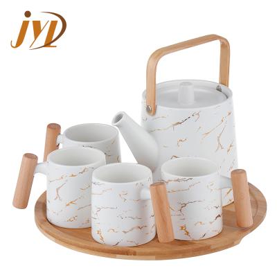 China Viable New Design Matte White Black Color Glaze Teapot Gold Printing Ceramic Mug Set With Wooden Tray for sale