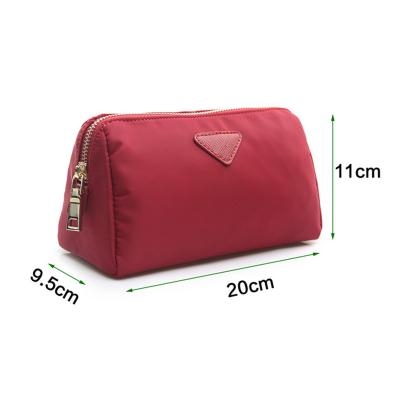 China 100% Eco-friendly Custom Waterproof Printed Cosmetic Pouches Red Polyester Toiletry Bag Makeup Pouches With Zipper for sale