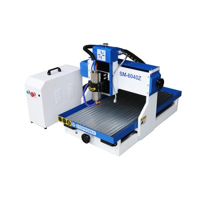 China Hotels Small Size 6040 Mini CNC Router 6040 MDF PVC Cutting Wood Engraving Machine for sale