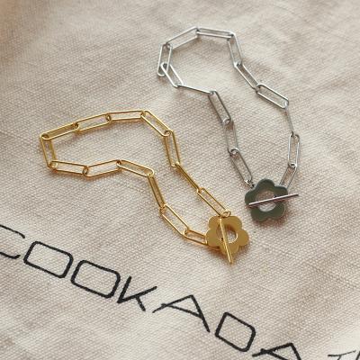 China Other Yiwu Coqi Gold Plated Stainless Steel Women's Jewelry Paper Clip Chain T Bar Daisy Flower Bracelets for sale