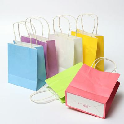 China High Quality Disposable Shopping Bags Festival Gift Bag Lot Color Kraft Paper Bag With Sturdy Handles for sale