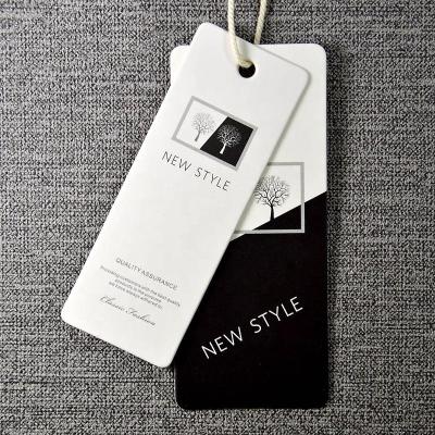 China Durable Hang Tags Designer Apparel Custom Cardboard Paper Swing Hang Tags For Jeans Clothing Own Logo for sale