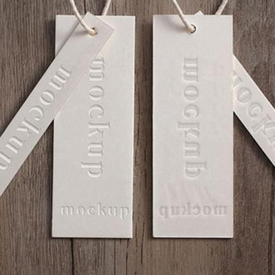 China Customized Viable Embossed Logo Paper Card Hang Tag Debossed Brand Name Garment Tags Swing Hang Tag For Clothing for sale