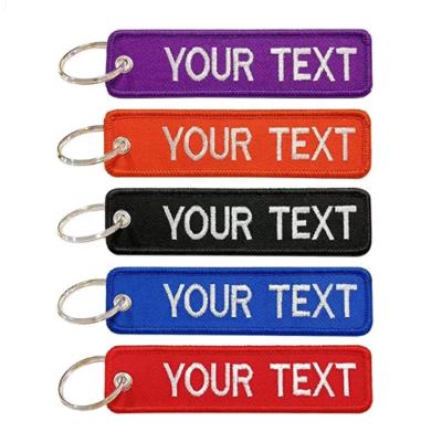 China Eco-Friendly Wholesale Car Embroidered Keychains High Quality Custom Brand Key Chain Cloth Logo Embroidery Key Chain for sale