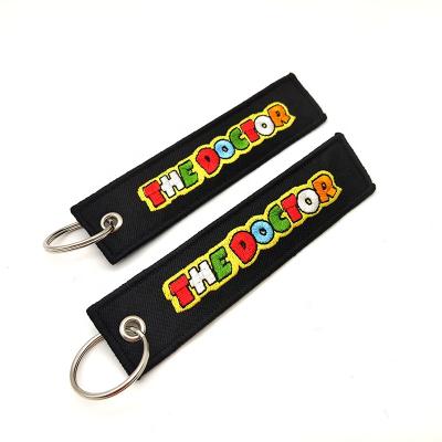 China High Quality Custom Embroidery Embroidery Airplane Flight Two Sides Cloth Key Chain With Your Own Logo for sale