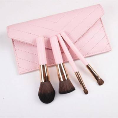 China Angular Blush HXT-043 New Fashion Portable 4pcs Cute Pink Handle Rose Gold Powder Foundation Blush Brush Brush Eyeshadow Makeup Set Brush for sale