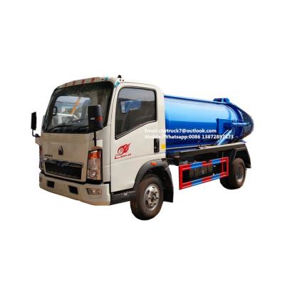 China Carbon Steel Q235 HOWO 5000liters Vacuum Sewage Suction Trucks 6 Wheels Sewage Suction Tanker Truck For Sale for sale