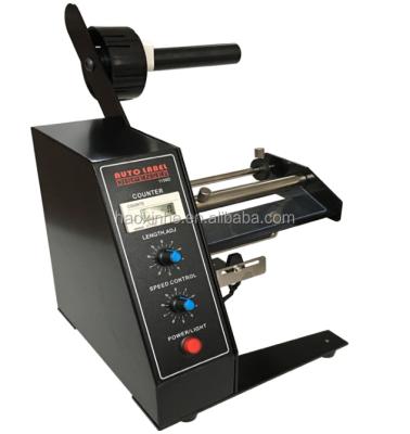 China CLOTHING Label Peeling Machine /Clothing Price Tag Dispenser for sale