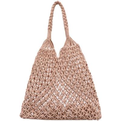 China Beach bag travel vacation strawbag 2022 new large waterproof handmade nc mesh hollow bag woven shoulder bag for women for sale