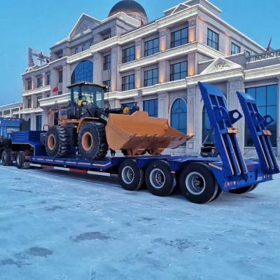 China Mechanical Suspension and Hydraulic Ramp 3 Axles 60T/80T Lowbed Semi Trailer for Truck for sale