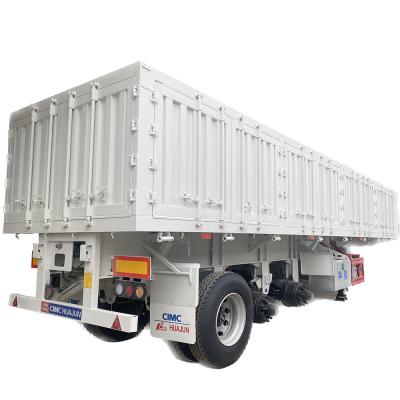 China Mechanical Suspension 3 Axle Side Tipping Semi Trailer for Smooth and Stable Transport for sale