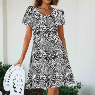 China Daily Life Swing Anti-Static Women's Casual Loose Short Sleeve Midi Light One-Line Printed Dress For Spring Summer for sale