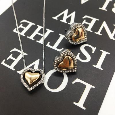 China To Make Girl Special Beautiful 18k Gold Silver Plated Two Tone Heart Shaped Necklace And Stud Earring For Women Jewelry Sets For Party for sale