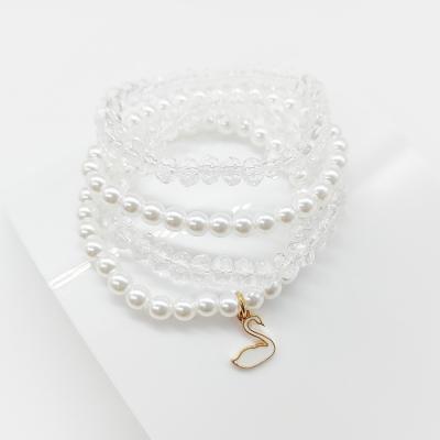 China To Make Girl Beautiful High Quality Elastic Four Layers Princess White Pearl Crystal Bead Cute Swan Pendant Bracelet For Kid Girls Gift for sale