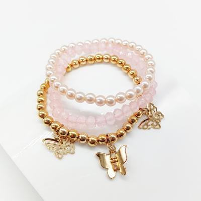 China To Make Girl Beautiful 3 Layers Hot Selling Pink Gold Quartz Pearl Beads With Butterfly Charms Handmade Stretch Bracelet For Kid Girls for sale