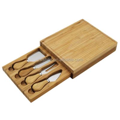 China Newest Sustainable Bamboo Cutting Board With Cutlery Drawer Inside Bamboo Cheese Cutting Board for sale