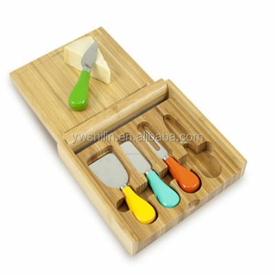 China Newest Sustainable Bamboo Cutting Board With Cutlery Drawer Inside Bamboo Cheese Cutting Board for sale