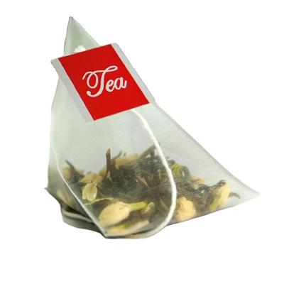 China empty nylon paper Corners Triangle tea bag private label pyramid tea bag en venta