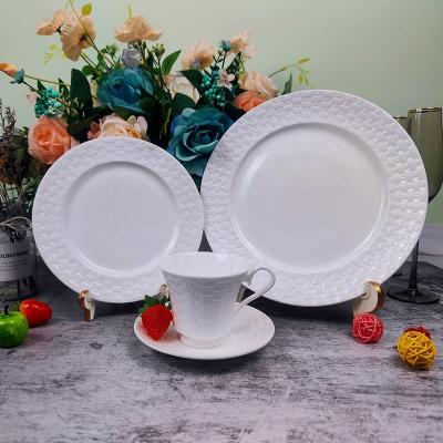 China Sustainable 2022 New Style Porcelain Dinnerware Sets Cafe Restaurant Tableware Cup Ceramic White Embossed Dishes And Dishes Tableware Set for sale