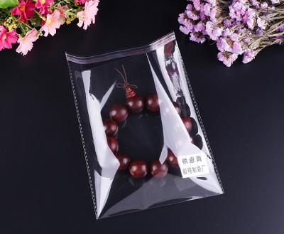 China Clear Moisture Proof Cellophane Cello Bags Card Display Self-adhesive Skin and OPP Seal Plastic Bag for sale