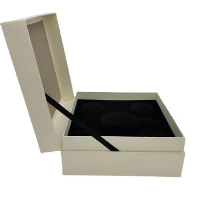 China Luxury Special Paper Tape Embossing Clamshell Box Present Box with Pearl Cotton Internal Parts zu verkaufen