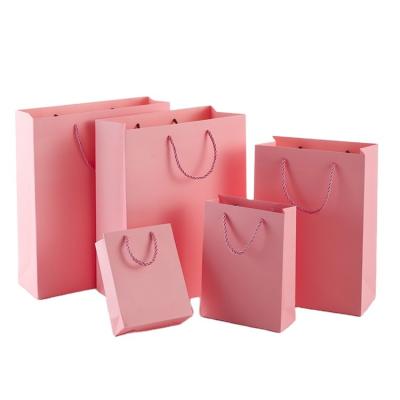 China Custom Printed Personalized Pink Art Paper Shopping Bag Tote Bags Paper Bags with your own logo For Clothes for sale