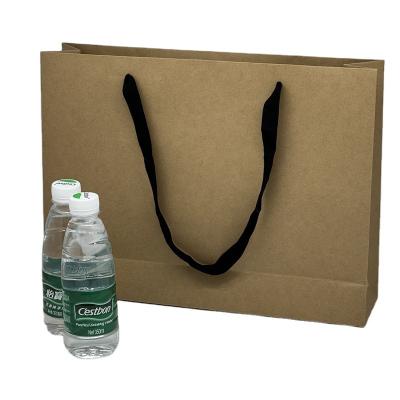 Cina 32*44*11cm 100 Pcs Biodegradable Brown Paper Bags Kraft Paper Bag with Handles in vendita