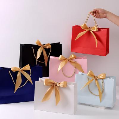 China 2021 Fashion Custom Size Large Retail Bag Paper Shopping Bags With Handle for sale