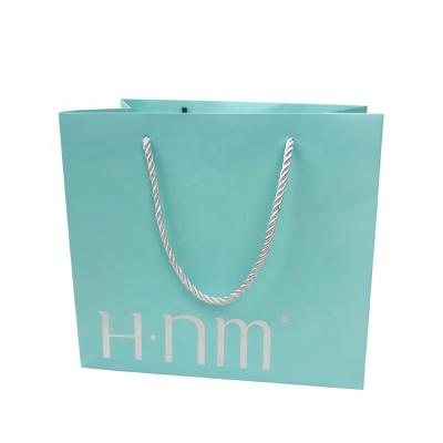 China OEM Recyclable Luxury Logo Silver Hot Stamping Shopping Bag Paper , Custom Printing Paper Shopping Bag for sale