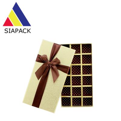 China Materials Manufacturer Customized Fashion Chocolate Gift Packaging Recycled Magnetic Folding Box With Ribbon for sale