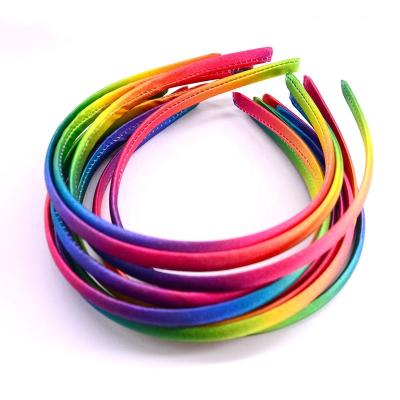 China Decorative Wholesale 1.5cm Rainbow print Satin warp Headbands Girls' Hair Bands for sale