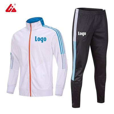 China Breathable Sublimation Short Sleeve Football Jersey Set Custom Football Tracksuits for sale