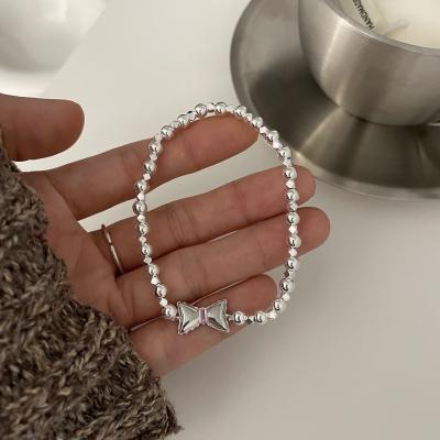 China High Quality Mothers Day Bracelet Adjustable Bow Pearl Hand String Silver Fashion Goes Bracelets With Everything for sale