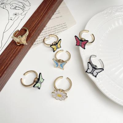 China Cute shangjie OEM Alloy Butterfly Daisy Spinner Enamel Color Stress Relieve Ring Unzip Worry Ring for sale