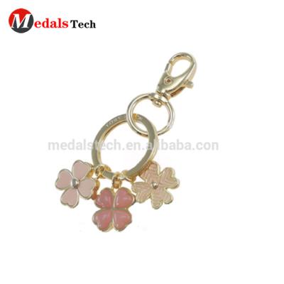 China Promotion gift colorful enamel custom design flower charm novelty keychains / key rings metal for sale