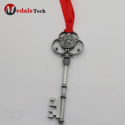 China Promotion Gift Christmas Monogram Silver Antique Santa's Magic Key With Red Ribbon for sale