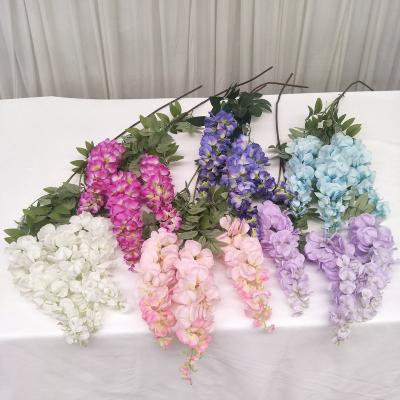 China Wholesale Art Decor Artificial Flower Vine Single Silk Three Fork Fake Wisteria Flower Garland for Indoor Wedding and Party Home Decor for sale