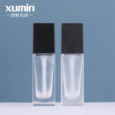 China Wholesale Personal Care Glass 30ml Cosmetic Bottle Transparent For Lotion Bottle for sale