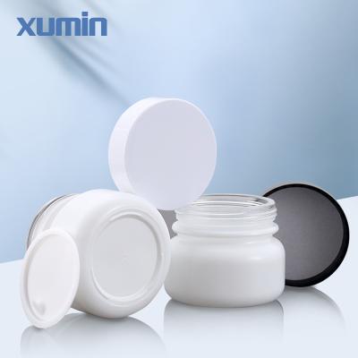 China Face Cosmetic Packaging 50g Cream Cosmetic Jars Frosted Clear PET Glass Cosmetic Jars With Glass Lid for sale