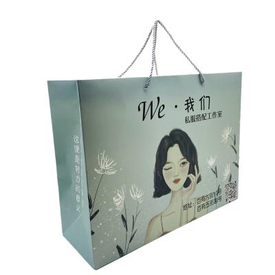 China Recyclable Eco-Friendly Luxury Printed Gift Paper Bag Cheap Printed Paper Bag With Logo Customized for sale