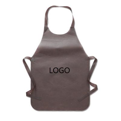 China Eco Promotional Cheap Disposable Nonwoven BBQ Cleaning Apron With Custom Logo for sale