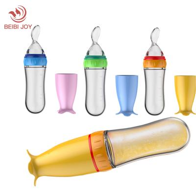 China BPA Free Silicone Baby Food Feeder Soft Squeeze Bottle For Solid Food With Dispensing Spoon 90ml for sale